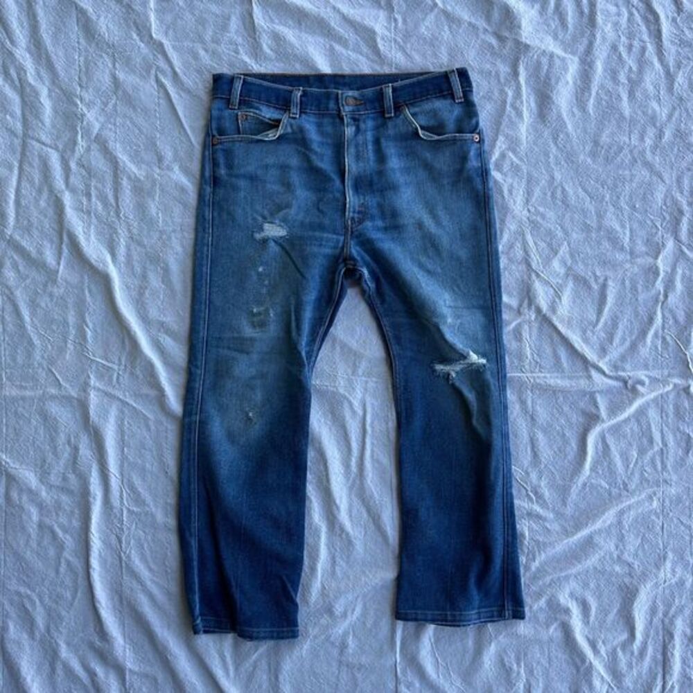 Vintage Distressed orange tab little e Levis pants